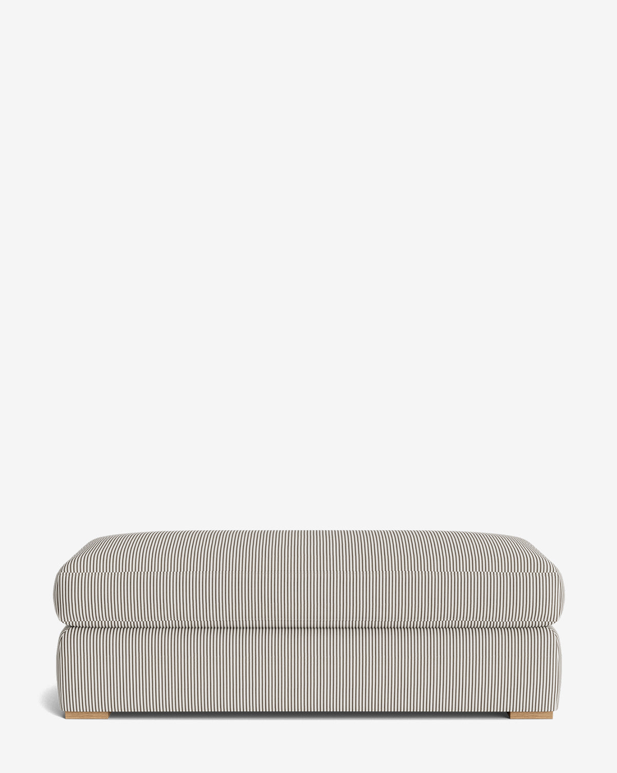 The Macy Upholstered Ottoman features thin black and white vertical stripes, a cushioned top, and low wooden legs—an ideal living room accent set against a plain white background, by Vendixs