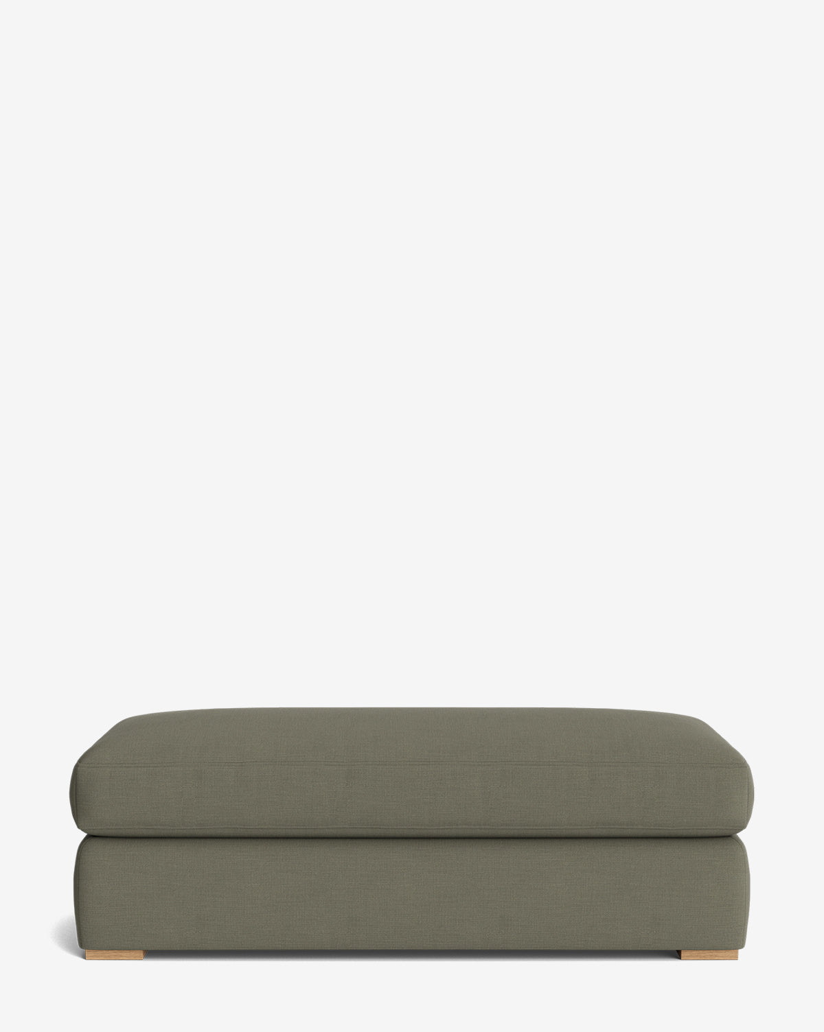 The Macy Upholstered Ottoman features a rectangular shape, olive green upholstery, modern design, and short wooden feet—making it a stylish, customizable piece for your living room, shown against a plain white background by Vendixs