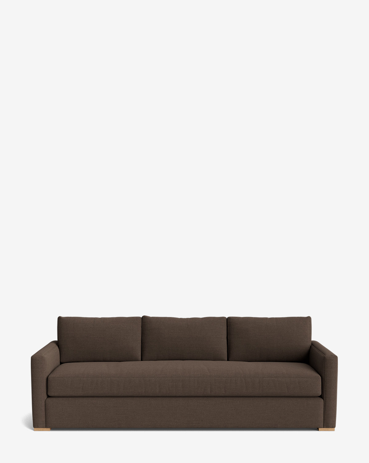 The Macy Upholstered Sofa (84-96) is a modern three-seater with straight arms, dark brown fabric, three back cushions, and wooden feet—stylish living room furniture set against a plain white background by McGee & Co.