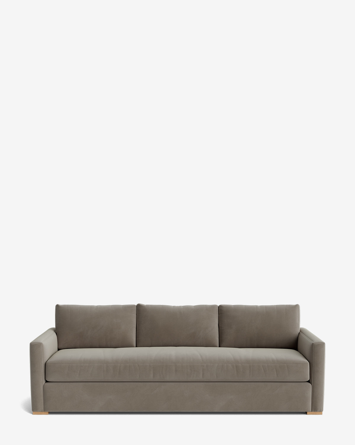 The Macy Upholstered Sofa (84-96) is a modern gray piece with three seat and back cushions, square arms, and short light wooden feet, all set against a plain white background for a sleek living room look, by McGee & Co.