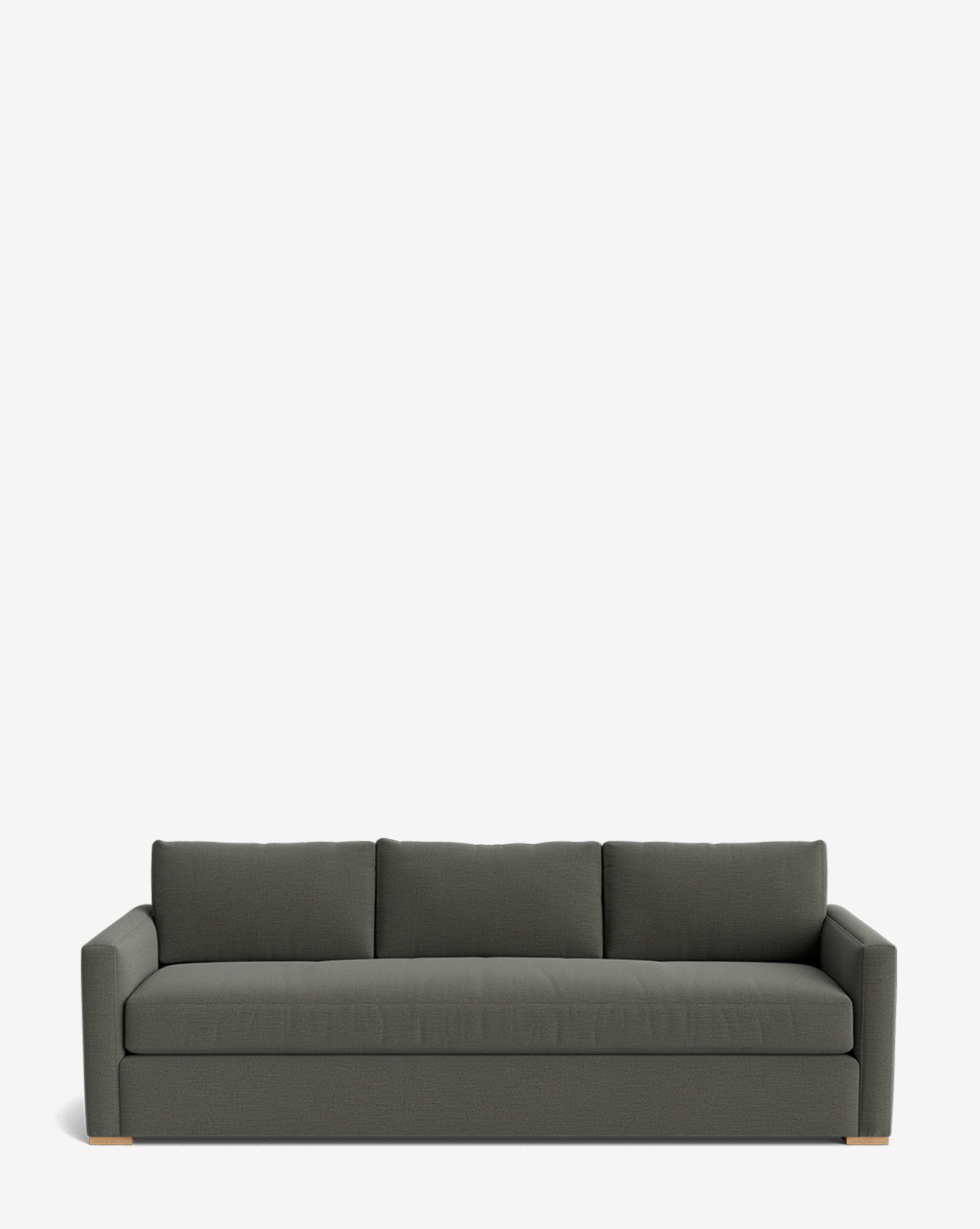 The Macy Upholstered Sofa (84-96) features a modern dark gray design with square arms, three back cushions, and wooden block feet, adding sleek style to your living room against a plain white background by Vendixs