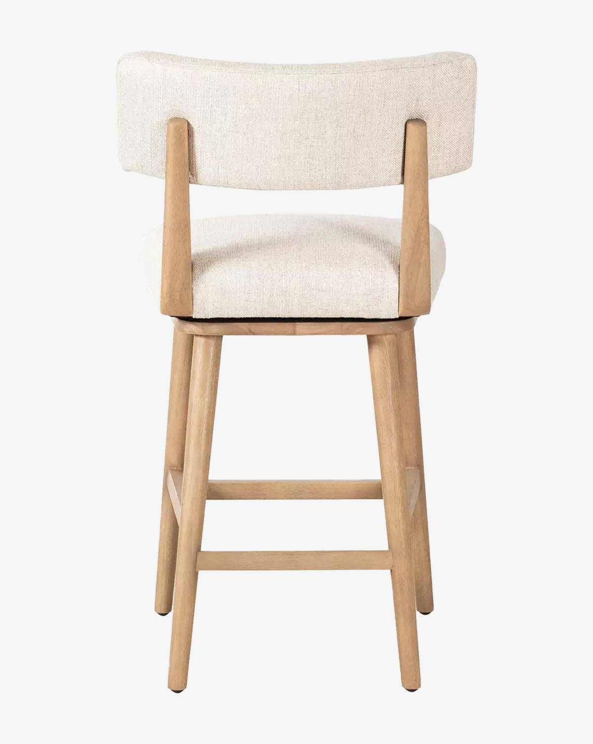 The Mance Swivel Stool by Four Hands features a wooden frame, upholstered seat, and light beige backrest, shown from the back against a white background. Its four legs with horizontal supports make it ideal for any kitchen. Vendixs