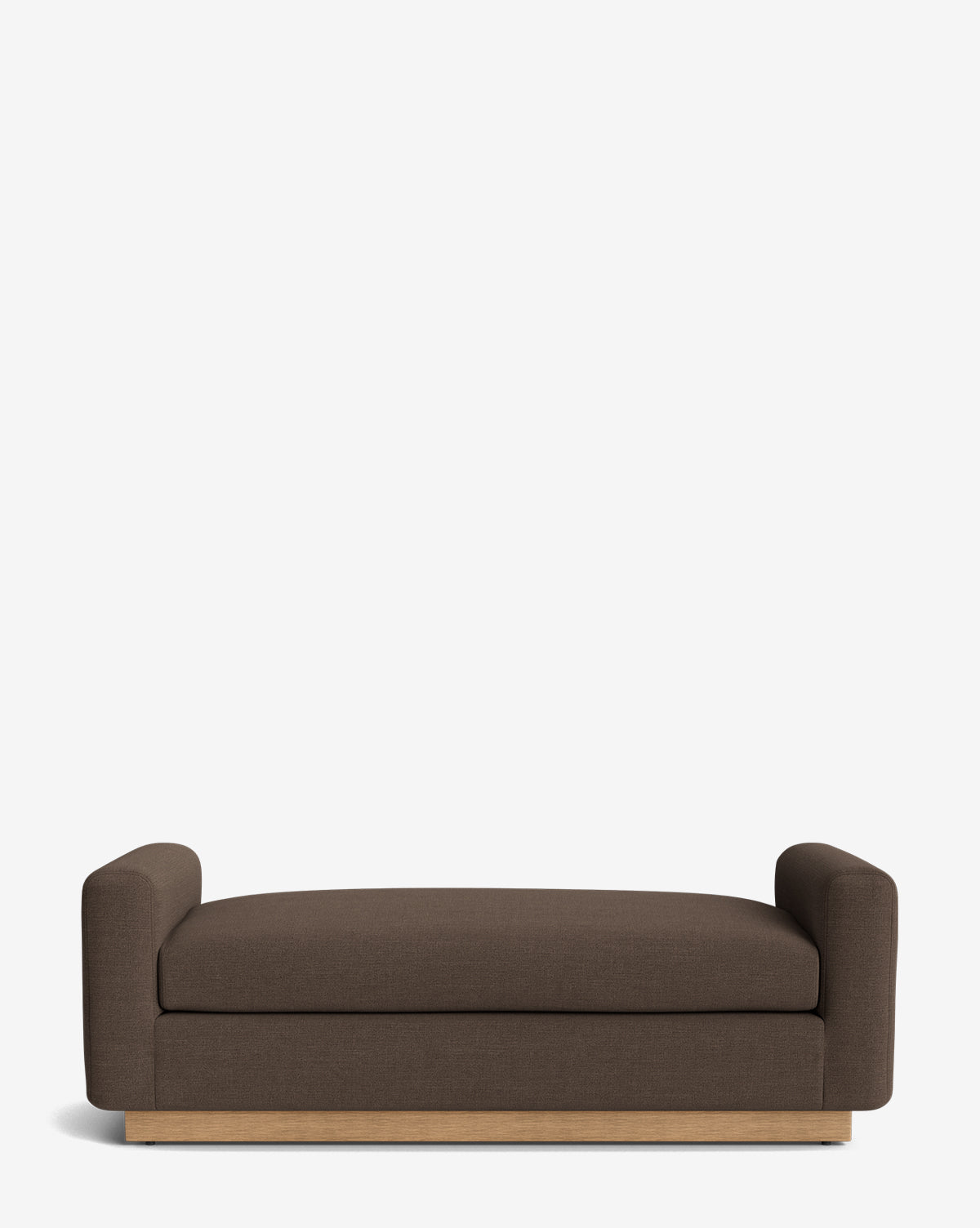 The Mansfield Bench features a modern design with brown upholstery, low rounded armrests, and a wooden base, shown against a plain white background by Vendixs