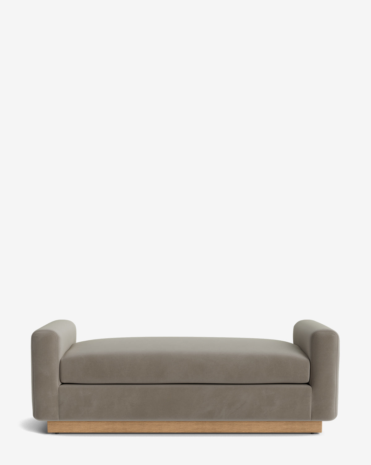 The handcrafted Mansfield Bench features a modern taupe design, low wide arms, and a wooden base, displayed against a plain white background, by McGee & Co.