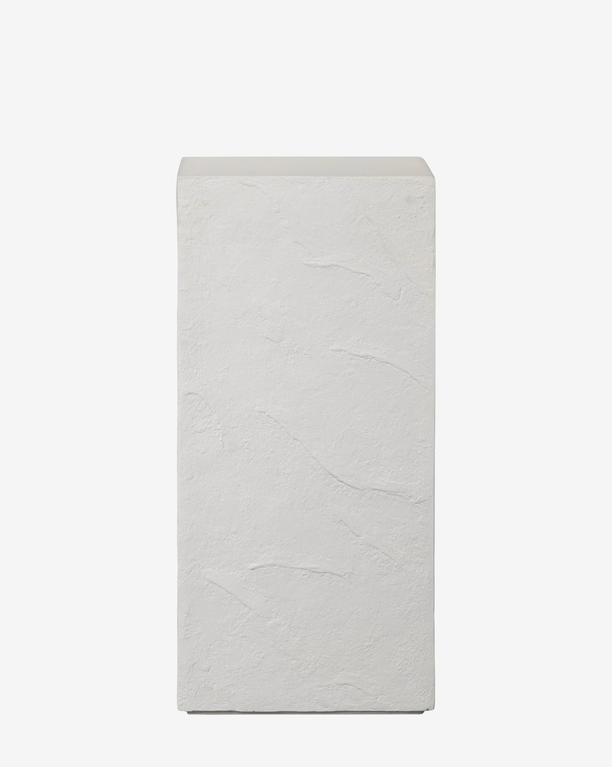 The Maravi Indoor/Outdoor Pedestal is rectangular and white with a textured, stone-like surface, perfect for versatile use indoors or outdoors, shown against a plain white background by McGee & Co.