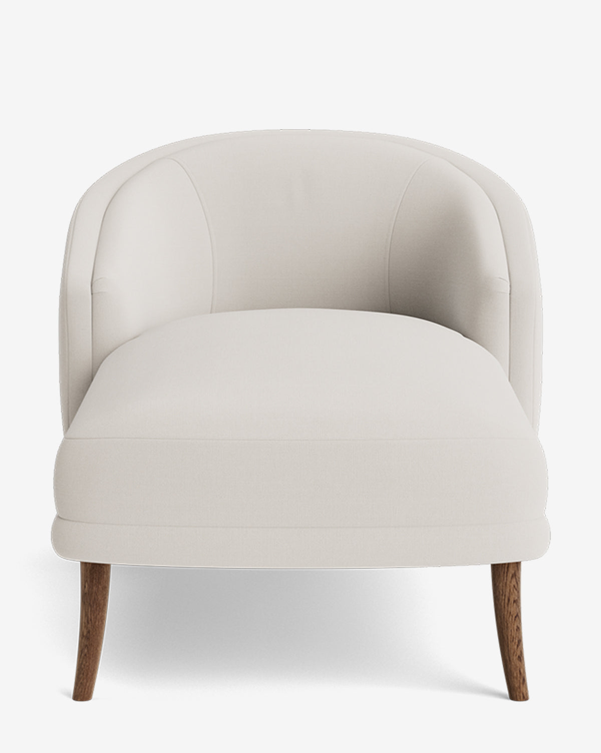 The Marguerite Chaise Lounge features a low, wide seat, curved backrest, light beige upholstery, and four angled wooden legs—capturing modern elegance in a traditional silhouette against a white background by McGee & Co.