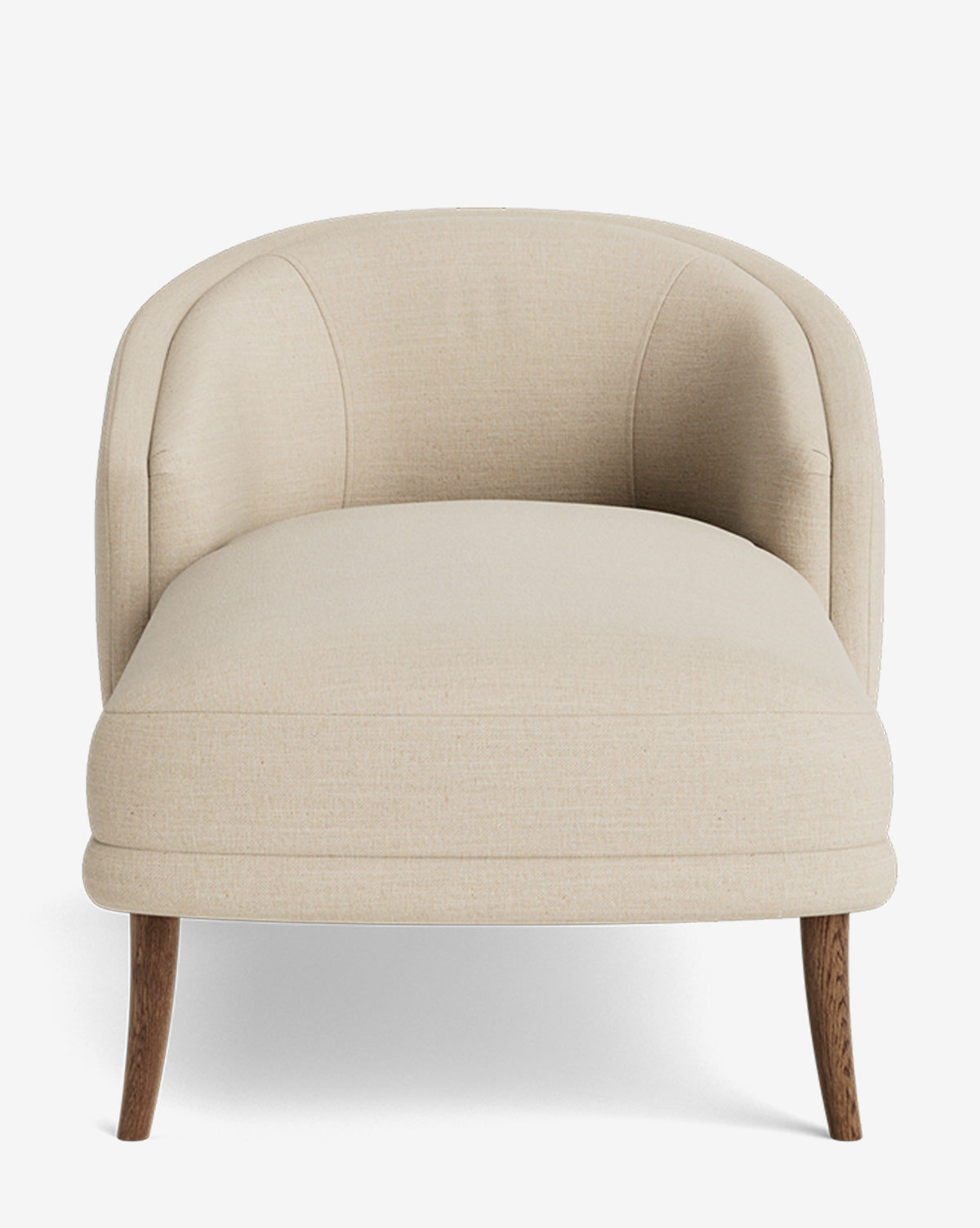 The Marguerite Chaise Lounge features a modern, armless design with a curved backrest in light beige upholstery and four angled wooden legs, combining comfort with modern traditional elegance, by McGee & Co.
