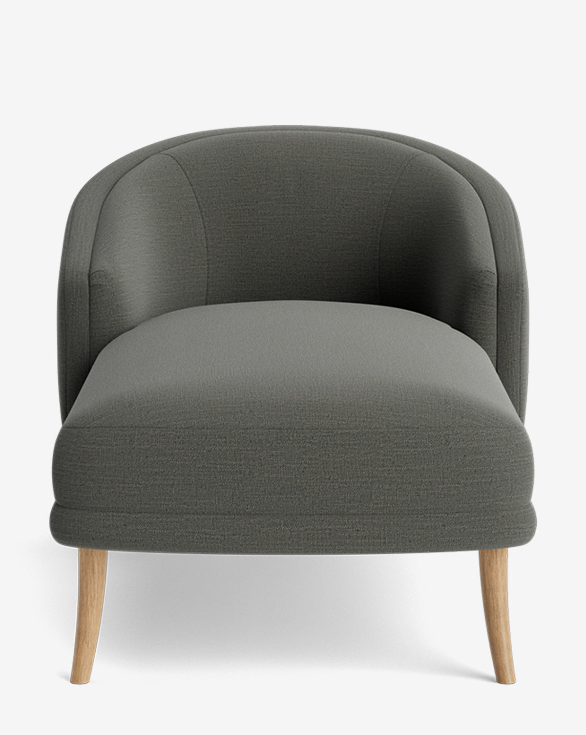 Front view of the Marguerite Chaise Lounge, a modern grey upholstered armchair with a curved backrest and light wooden legs, inspired by elegant design, set against a plain white background, by McGee & Co.