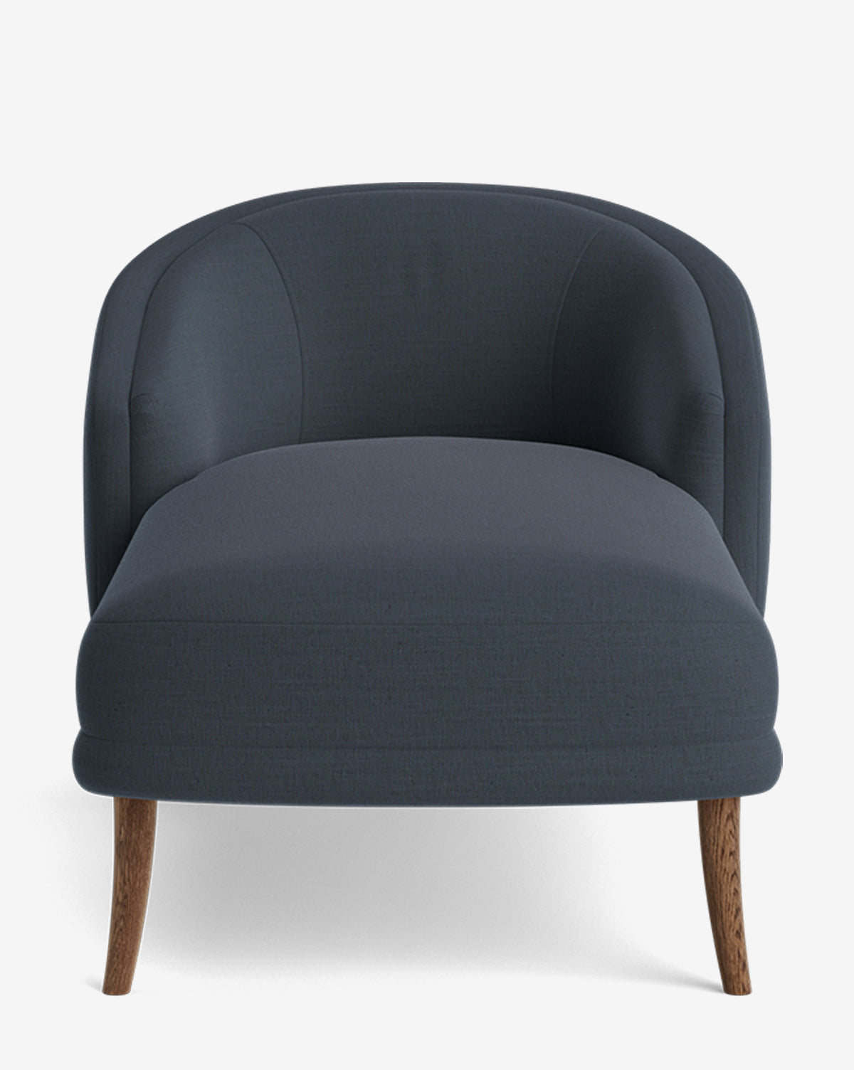 Front view of the Marguerite Chaise Lounge, featuring dark blue upholstery, a curved backrest, and wooden legs in a modern traditional style, shown on a white background, by McGee & Co.