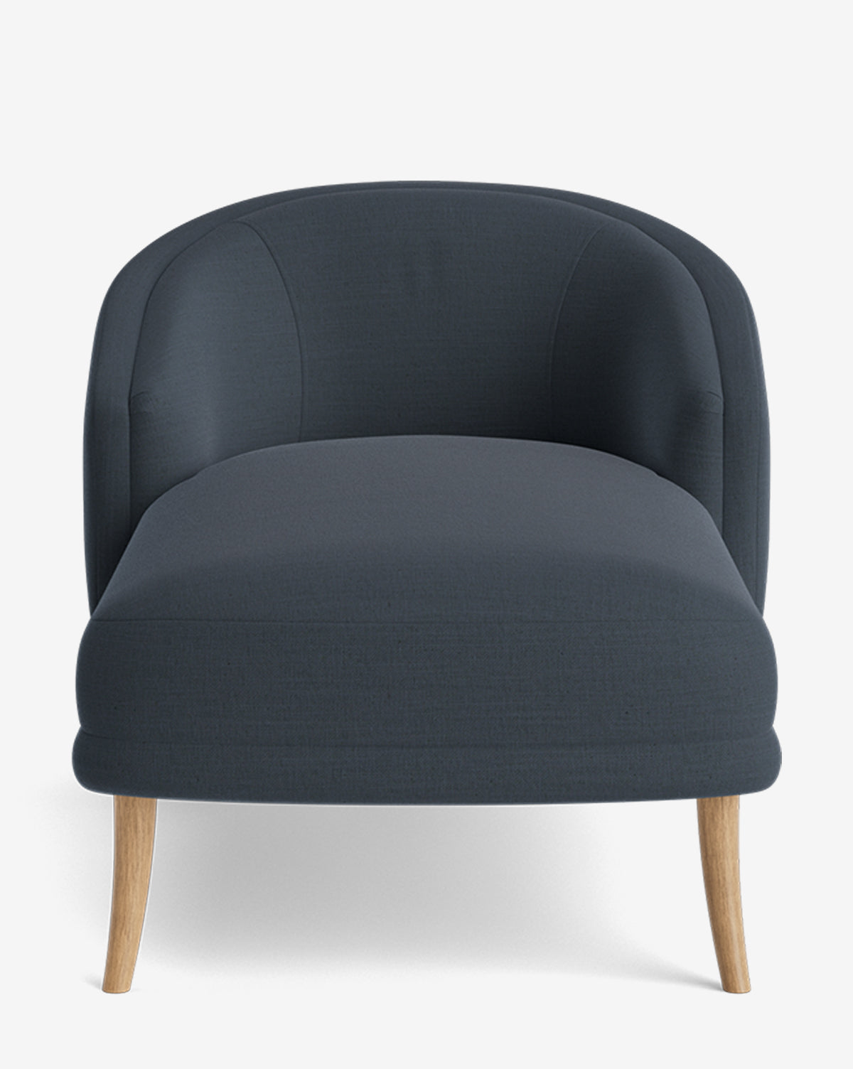 The Marguerite Chaise Lounge is shown from the front against a plain white background, featuring dark blue upholstery, a rounded backrest, and light wooden legs, by McGee & Co.