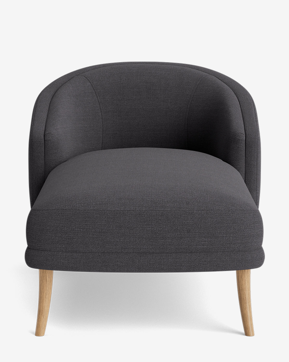 The Marguerite Chaise Lounge is a modern, dark gray upholstered armchair with a curved backrest and light wood legs, shown from the front against a plain white background by McGee & Co.