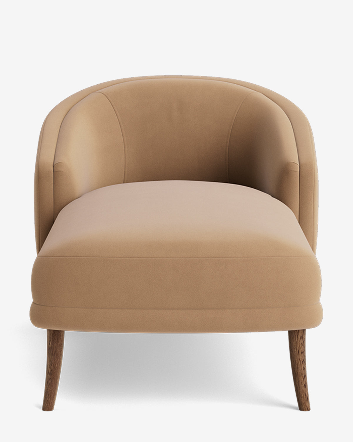 The Marguerite Chaise Lounge is a modern, light brown upholstered chair with a curved backrest, armrests, and four angled wooden legs, shown against a plain white background by McGee & Co.