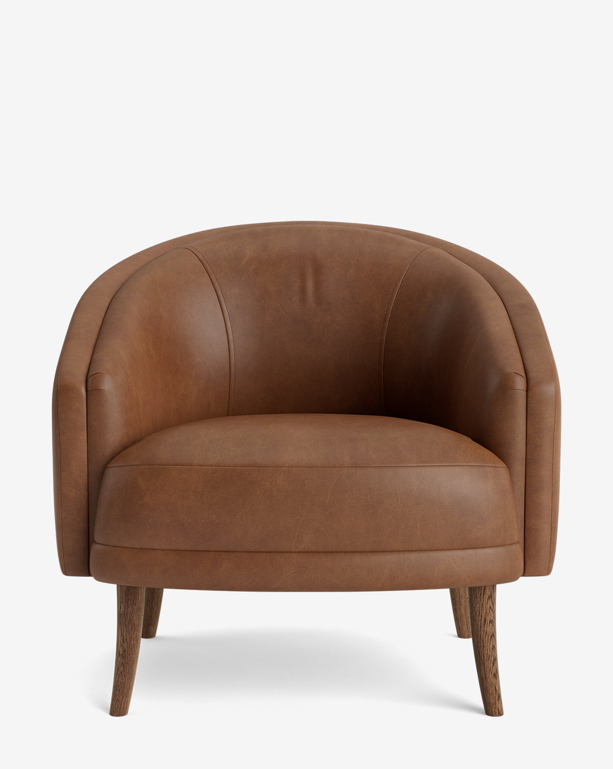 The Marguerite Lounge Chair is a brown leather armchair with a curved back and wooden legs, set against a white backdrop—an ideal modern addition to any stylish living space, by McGee & Co.