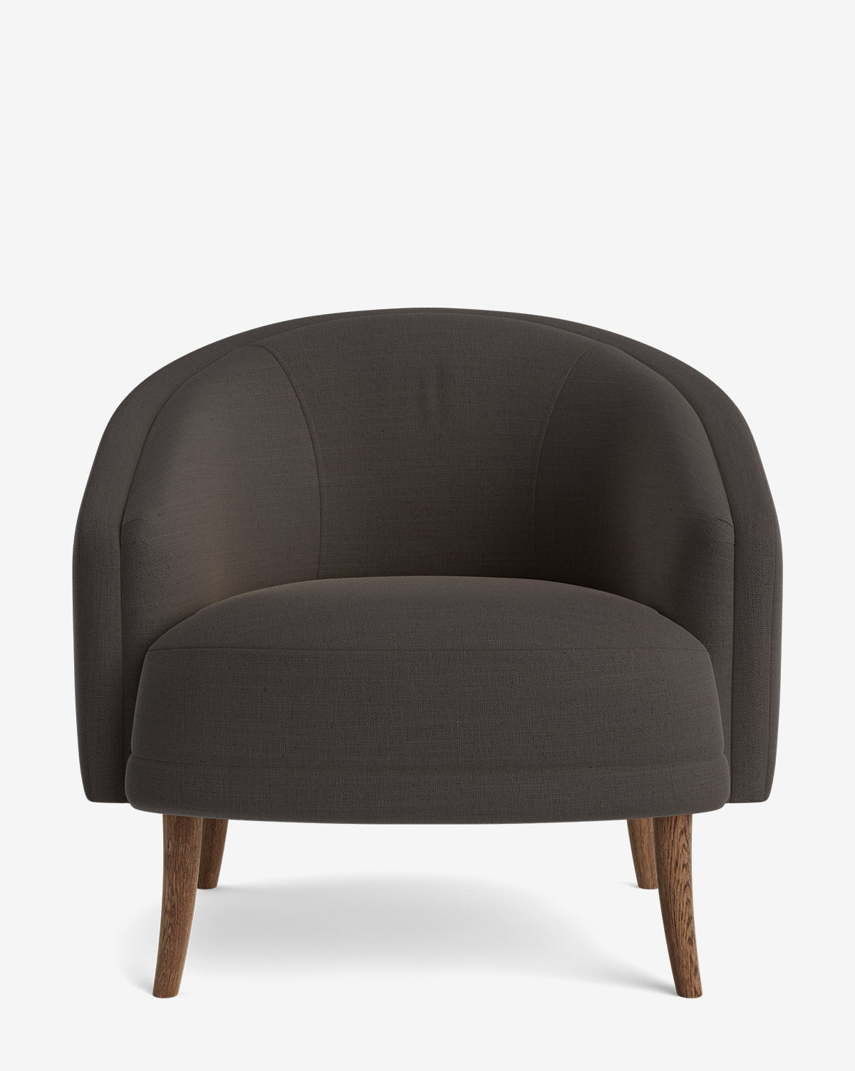 The Marguerite Lounge Chair features a modern design in dark gray with a rounded backrest, wide cushioned seat, and four slightly angled wooden legs, shown against a plain white background by McGee & Co.