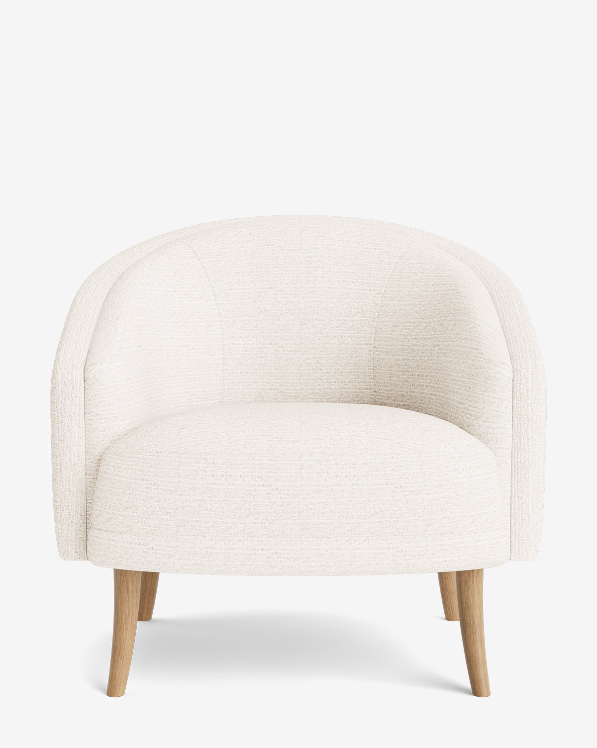 The Marguerite Lounge Chair showcases a modern curved design with textured off-white upholstery and four light wooden legs, styled against a plain white background by McGee & Co.