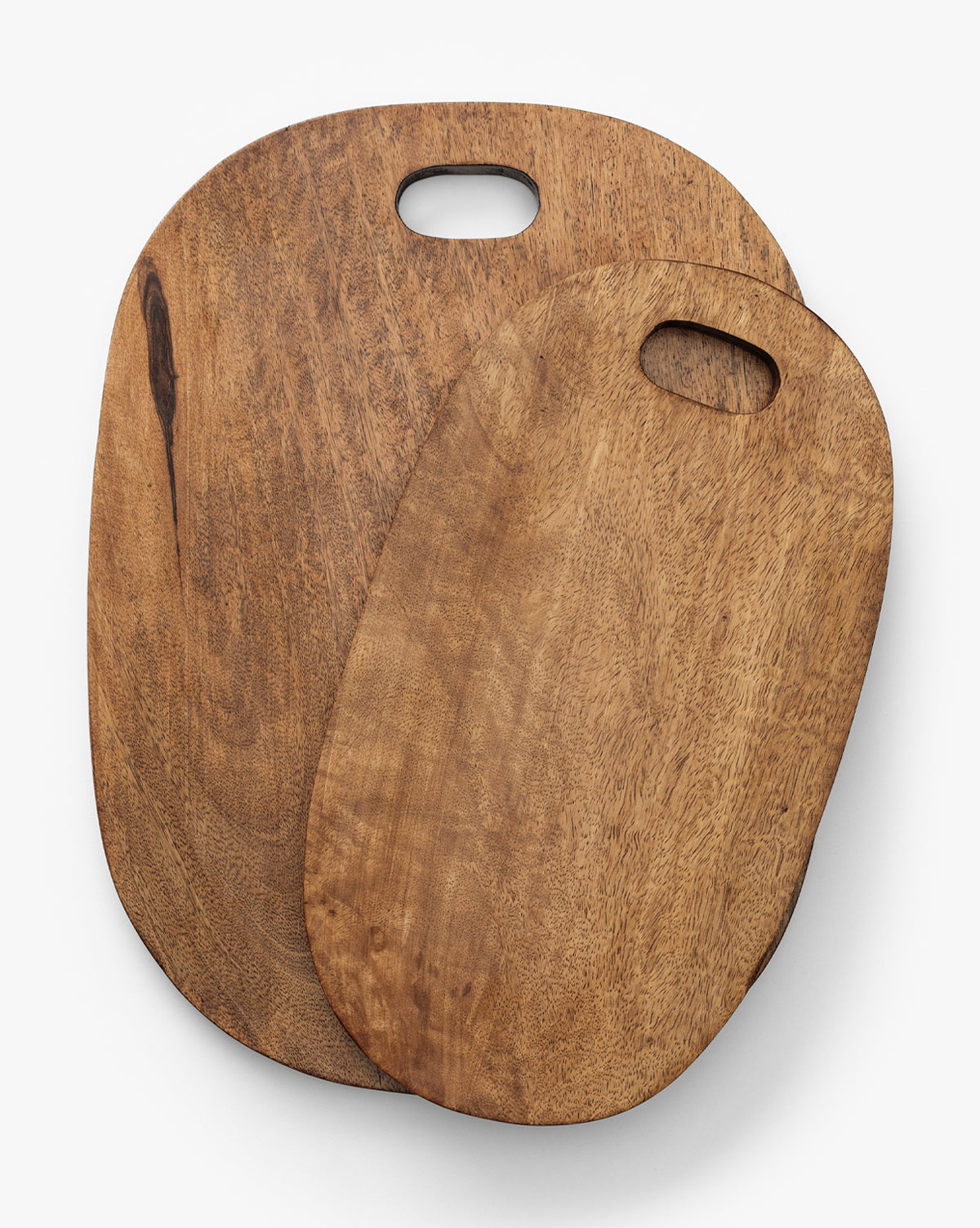 Two Marlton Breadboards with rounded corners and handle holes are stacked against a white background. The smaller board slightly overlaps the larger one, adding a touch of artisanal kitchen decor, by Vendixs
