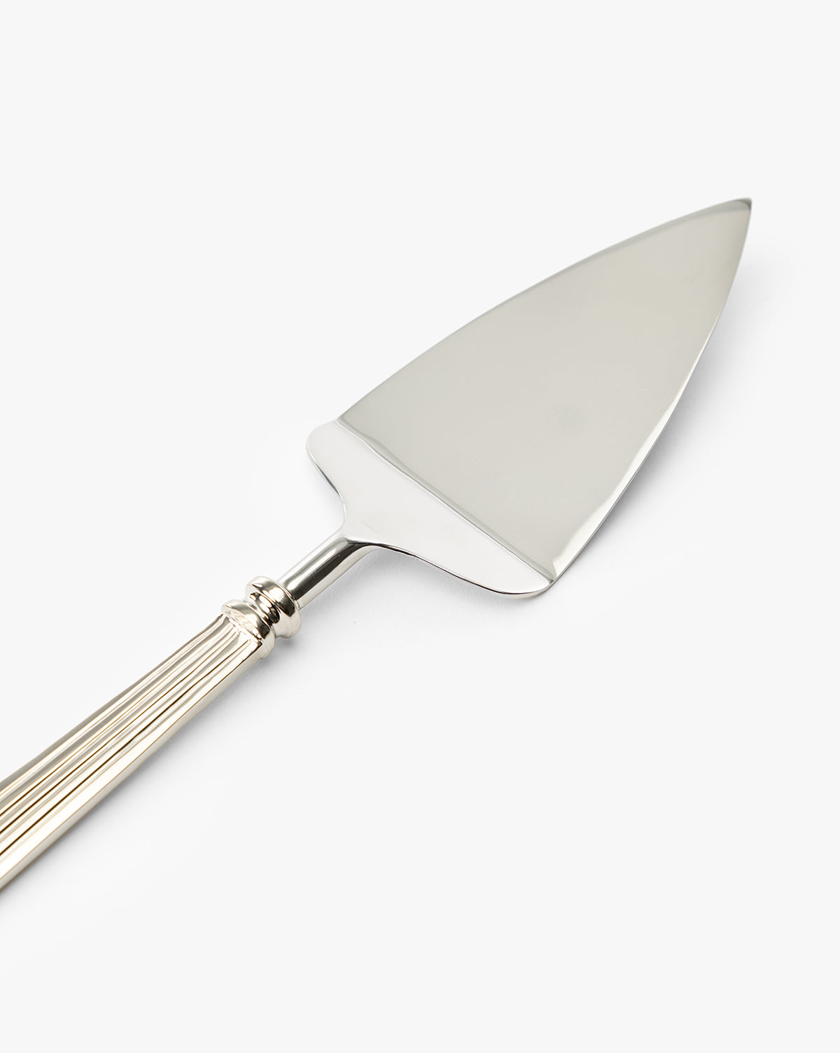 The McNully Pie Server is a silver dessert server with a flat, triangular blade and a decorative ridged handle, shown on a white background by Vendixs