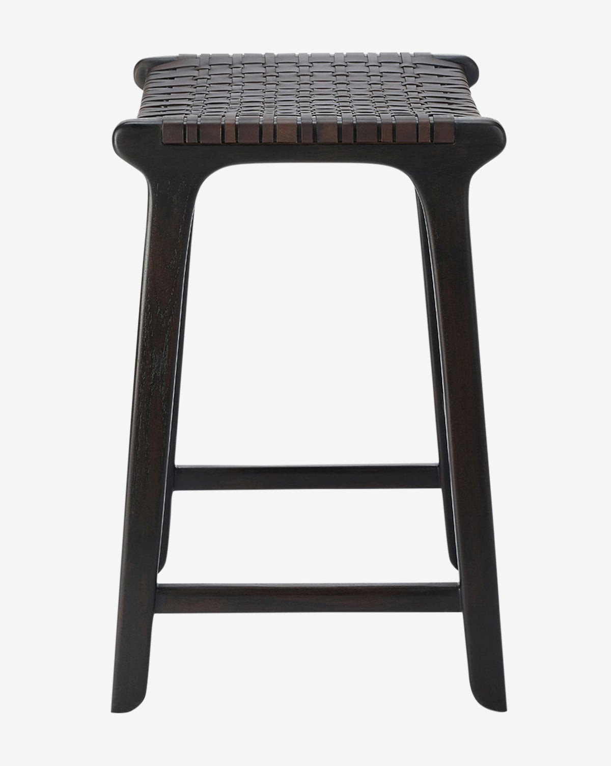 The Meliora Counter Stool by Made Goods features a dark brown, flat-woven seat and a teak frame with four angled legs and horizontal supports, shown from the front on a white background. Vendixs