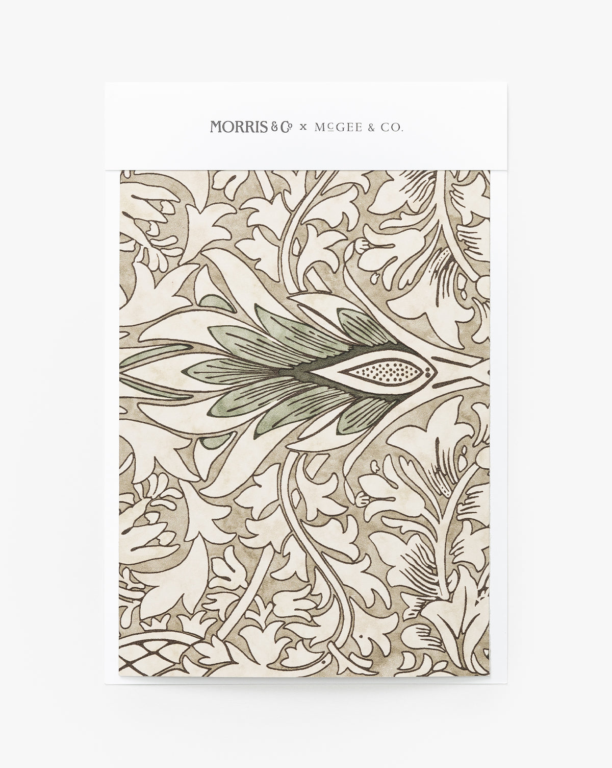 A wallpaper swatch featuring an intricate, vintage-inspired leafy Snakeshead pattern in beige, green, and cream by Sanderson Design Group, Inc., from the Morris & Co. x Vendixs collaboration. Vendixs
