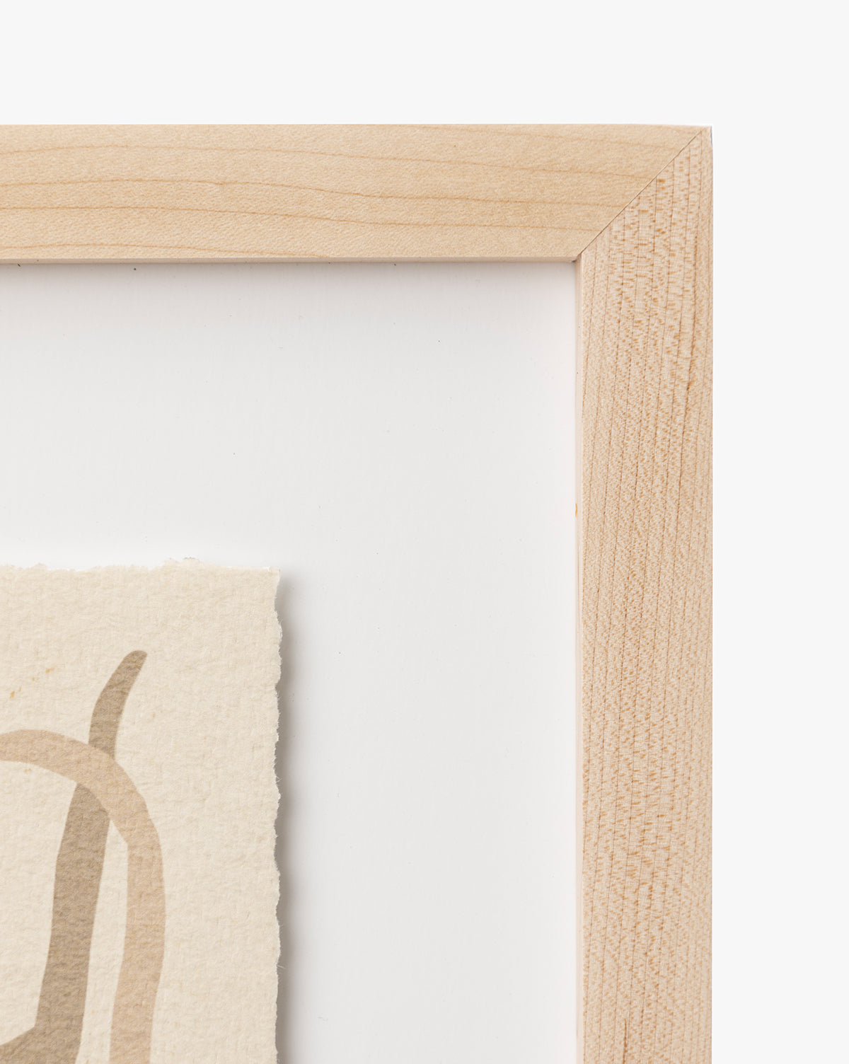 Close-up of the top right corner of a maple frame displaying Moth IV By Coup dEsprit on textured off-white paper with beige abstract details. The plain white background makes it ideal for nursery wall art or modern interiors, by Vendixs
