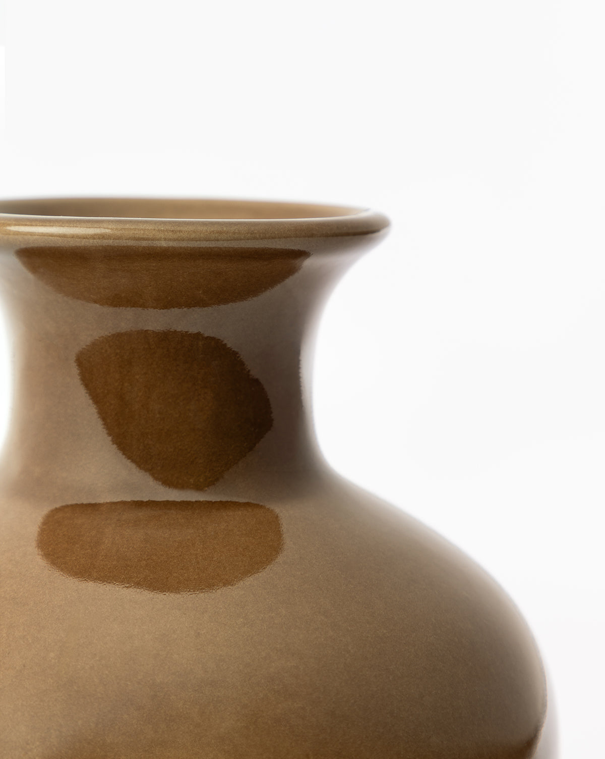 Close-up of the upper section of the glossy brown Natalia Vase, featuring a rounded body and narrow neck, photographed against a plain white background, by Vendixs