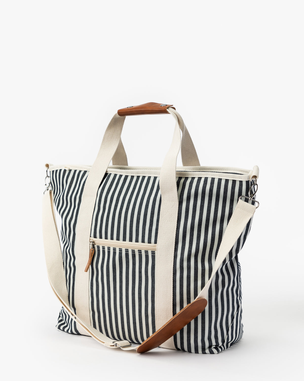 Close-up of Navy Striped Cooler Bag’s striped fabric, highlighting waterproof construction, from Vendixs