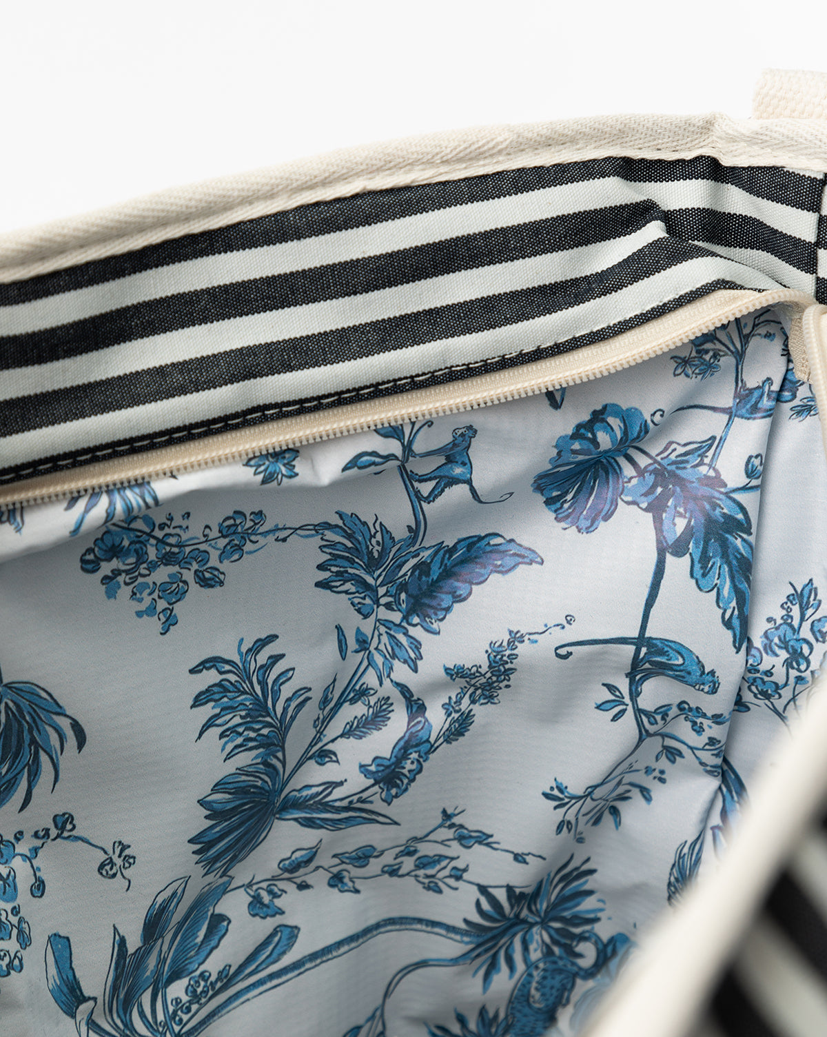 Close up of interior detail of the Navy Striped Cooler Bag in profile, from Vendixs