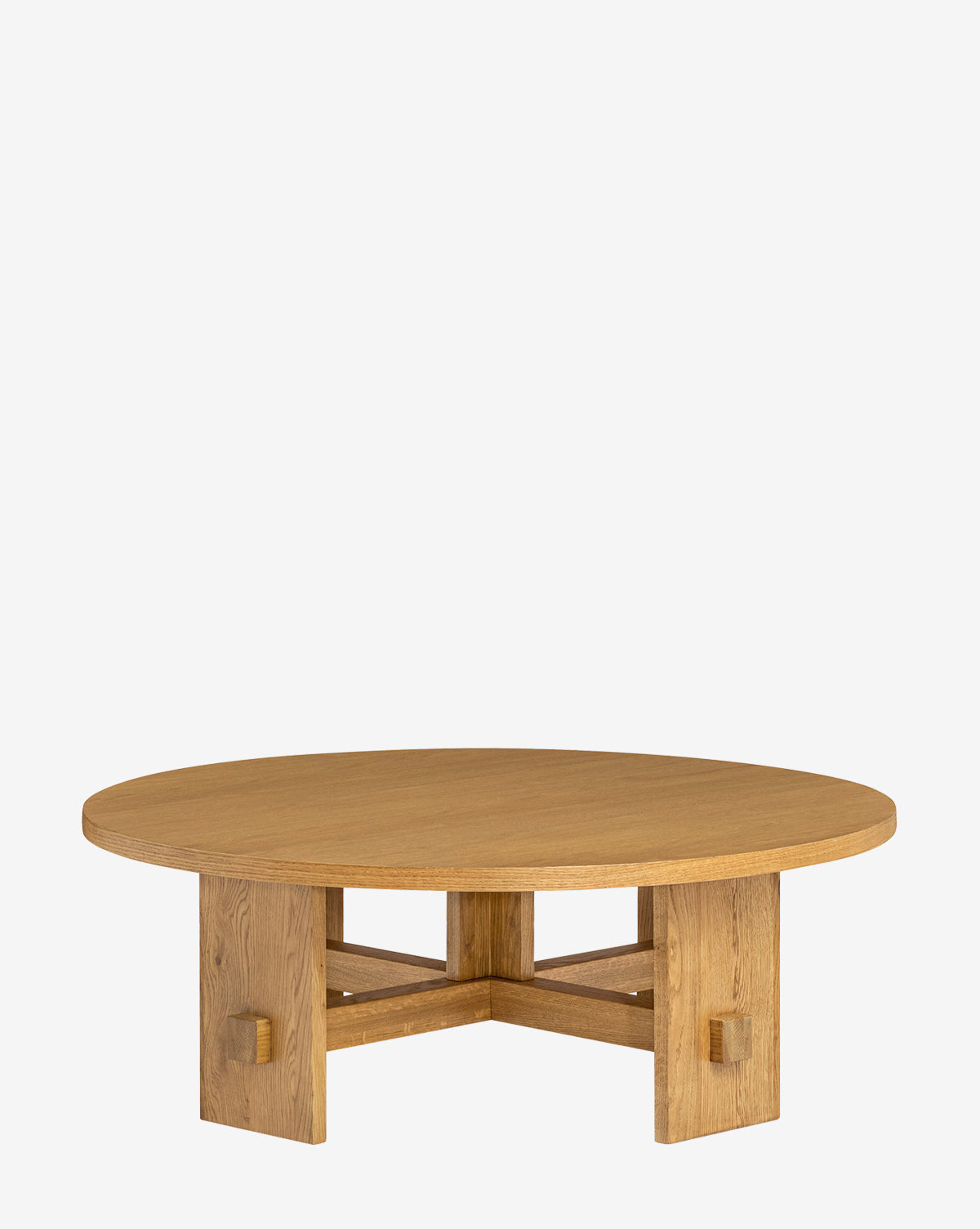 The Newbold Coffee Table is a round oak table with sturdy intersecting legs, a smooth top, and a natural honey finish, boasting a minimalist design against a plain white background, by Vendixs