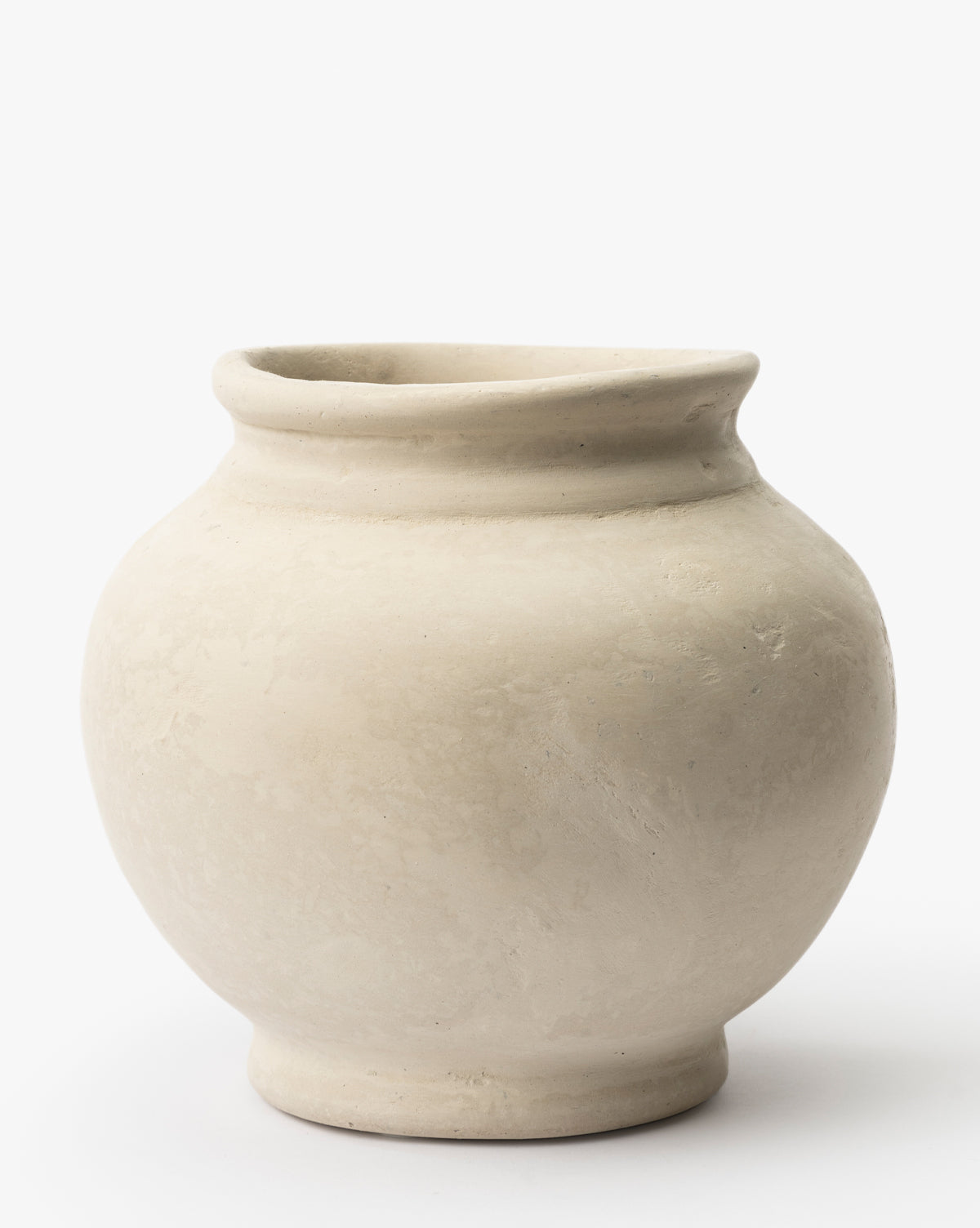 The BIDK Home Nola Paper Mache Vase features a round, off-white design with a wide body, narrow base, and slightly flared rim, shown against a plain white background, Vendixs