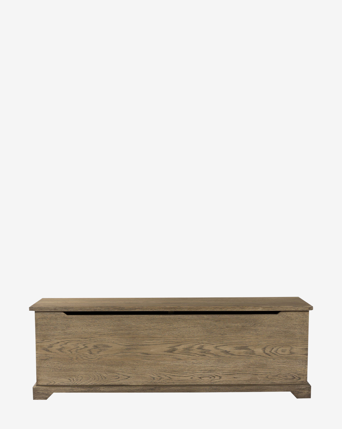 The Norman Bench by Four Hands is a solid oak rectangular bench with a hinged lid, natural wood grain finish, and built-in storage. Its simple design suits any entryway, shown here against a plain white background. Vendixs