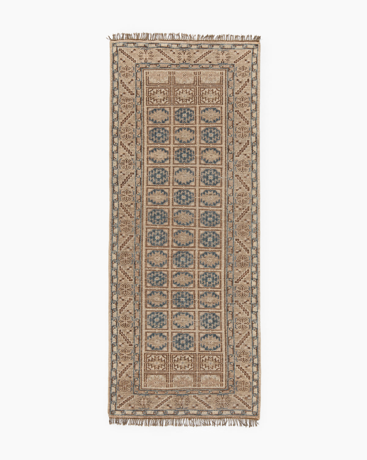 The Nunez Hand-Knotted Wool Rug features a rectangular shape with a beige and light brown border, blue and tan repeating central motifs, and short fringe on both ends for a timeless look, by Vendixs