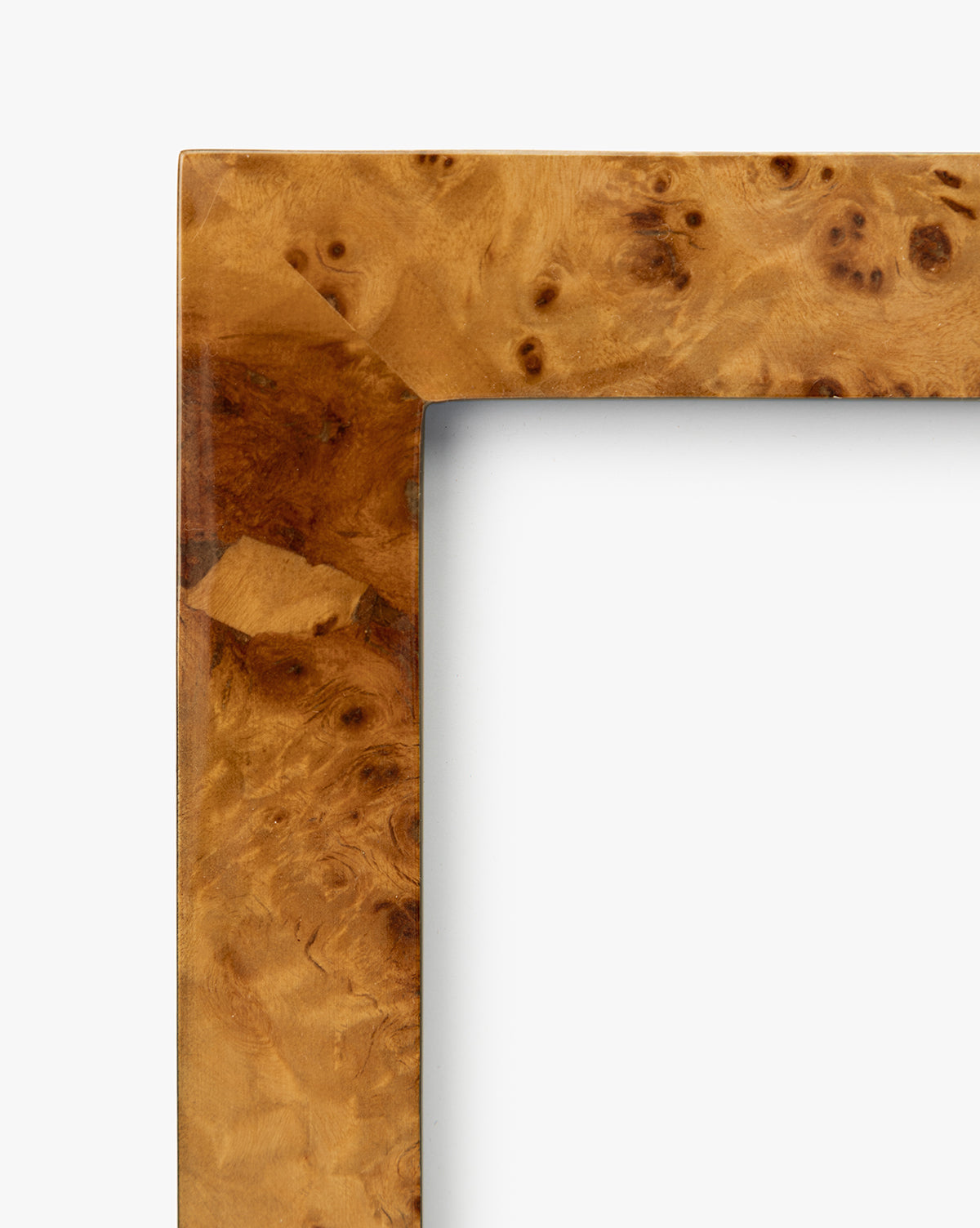 A close-up of the Oliver Burl 5x7 Frames (Set of 2) highlights their glossy, polished finish and natural wood grain—ideal for enhancing your home decor, by Vendixs The background is plain white.