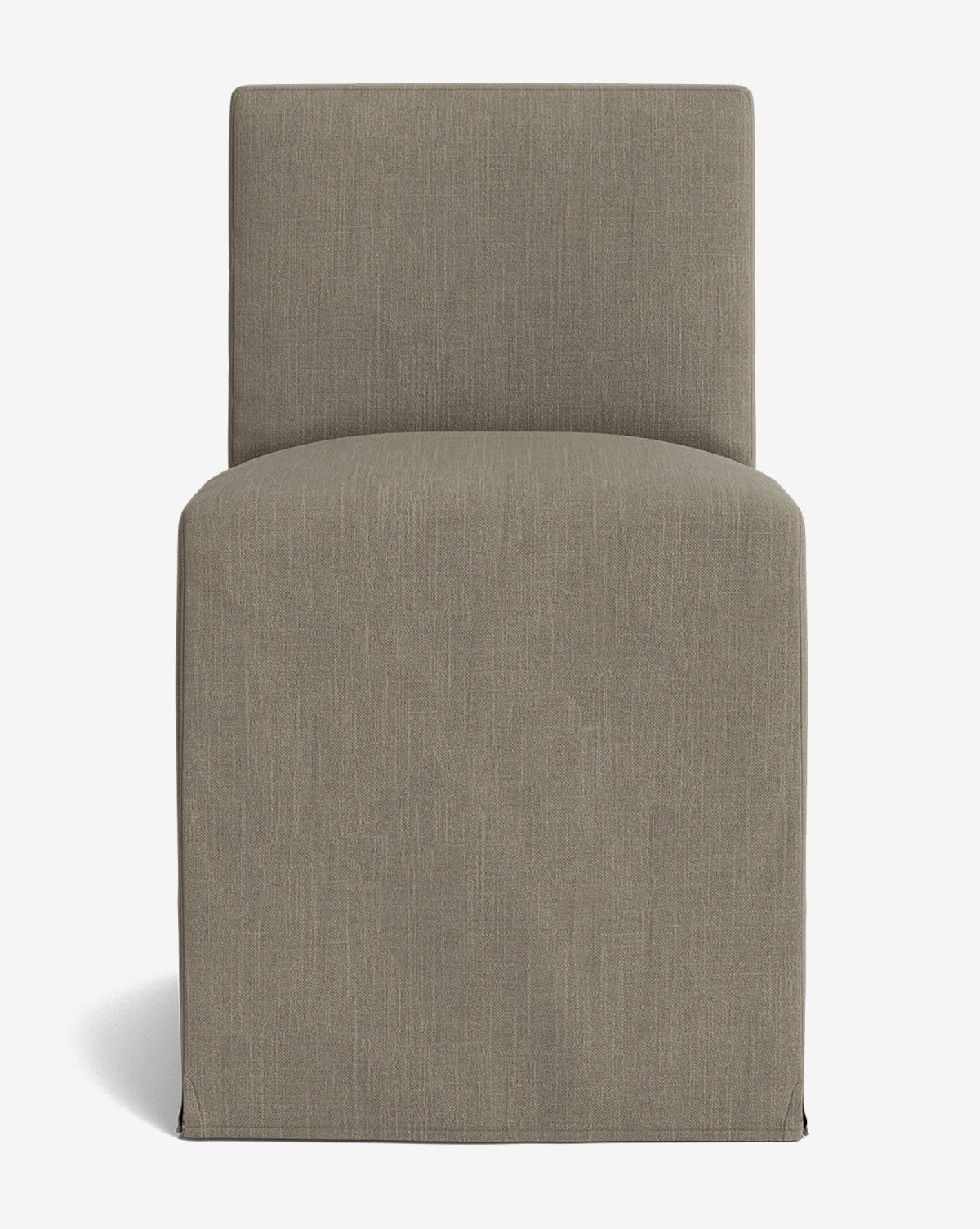 Front view of the Olivier Slipcover Dining Chair, a modern armless design with a straight back and seamless taupe upholstery. Boxy and elegant, it brings contemporary style to any dining space and is shown against a white background, by McGee & Co.