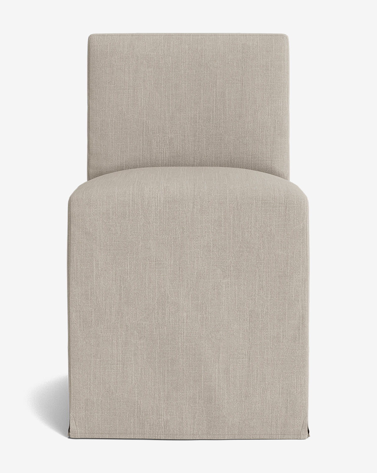 Front view of the Olivier Slipcover Dining Chair, featuring light beige fabric upholstery, an armless design, and a straight backrest, set against a plain white background, by McGee & Co.