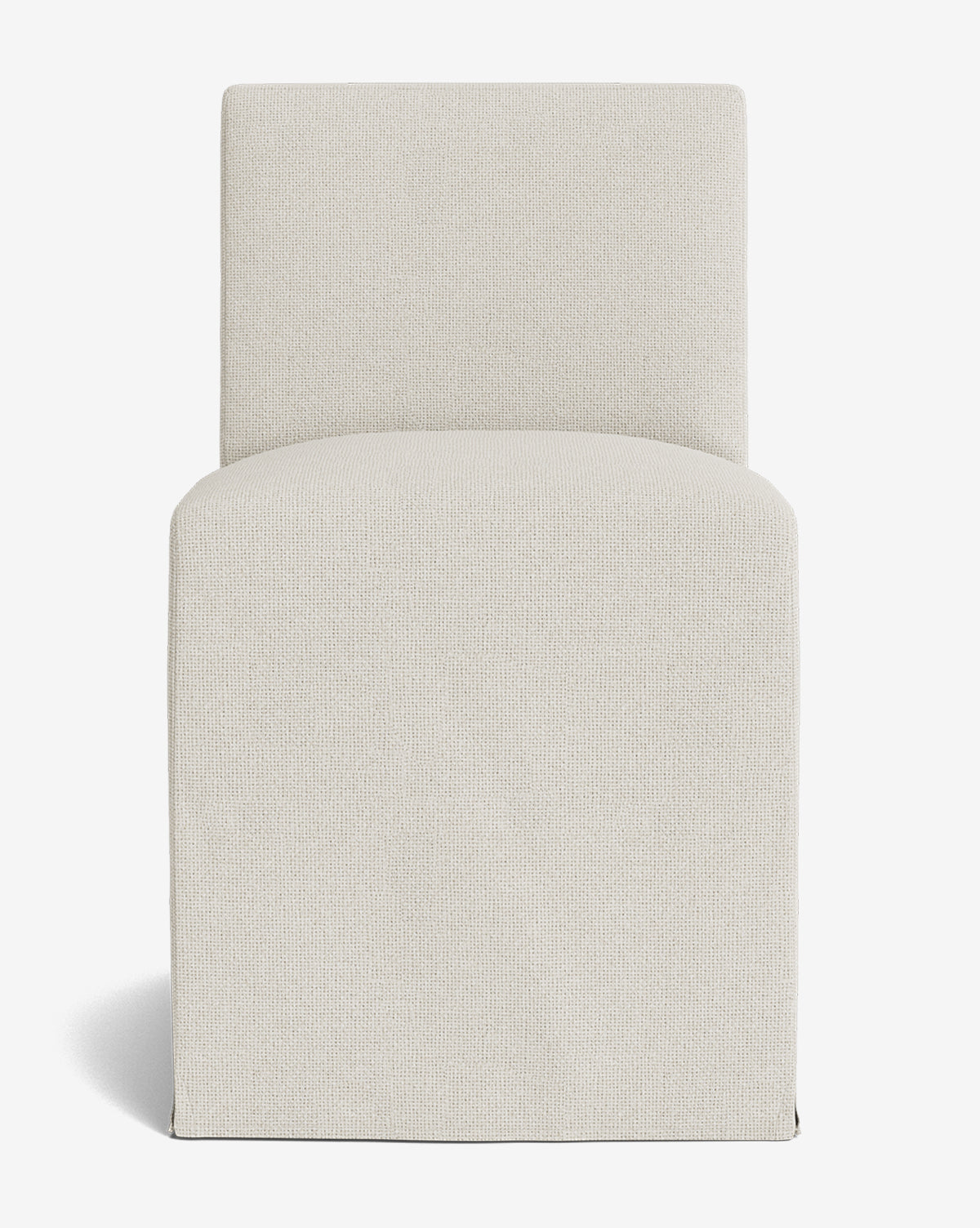 The Olivier Slipcover Dining Chair features a straight back, square seat, and clean lines, fully upholstered in textured off-white fabric. Its boxy, minimalistic design with hidden legs suits contemporary dining spaces perfectly by McGee & Co.