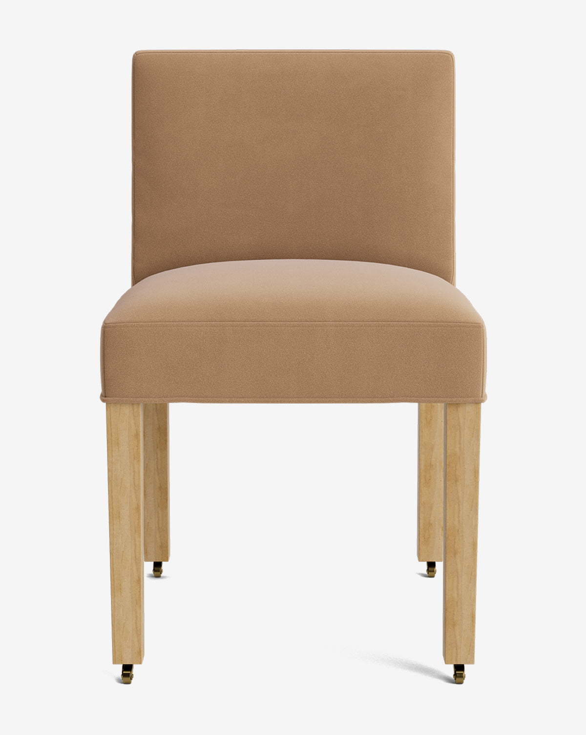 The Olivier Upholstered Dining Chair features a tan high-quality fabric seat and backrest, armless design, and four light wooden legs with brass-capped feet, shown against a plain white background by Vendixs
