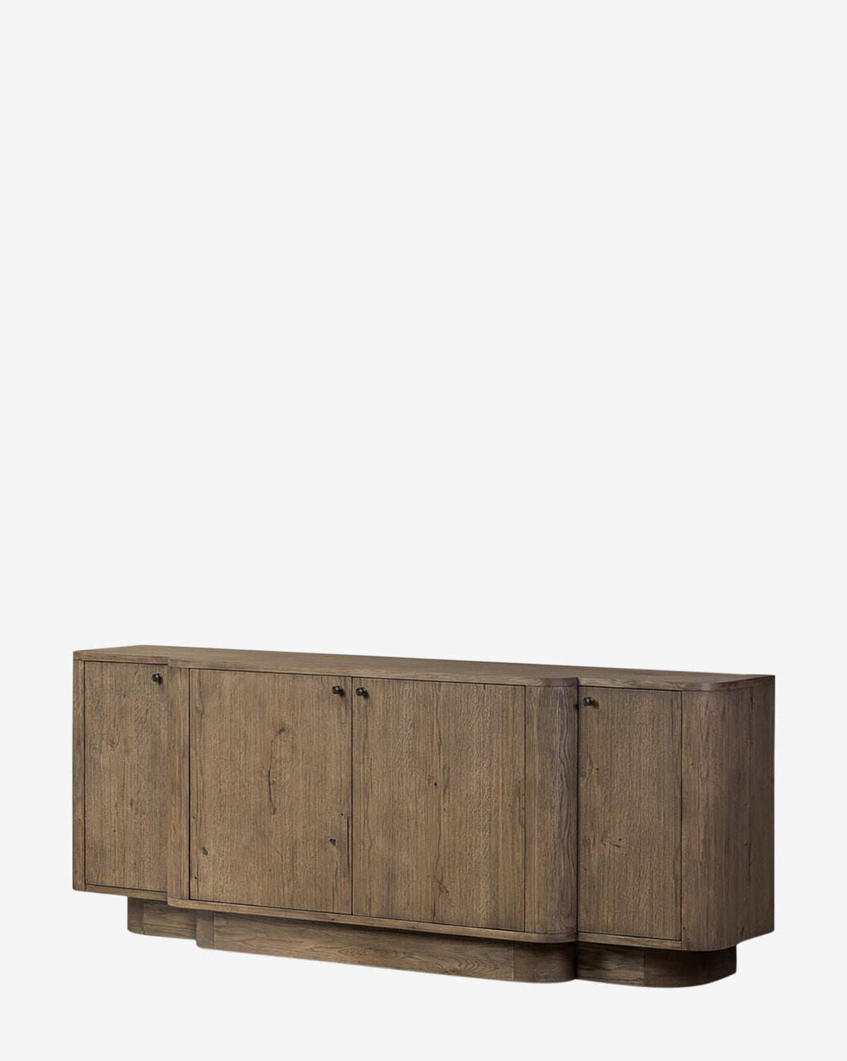 The Oswin Sideboard showcases a modern weathered oak look with a natural finish, break-front design, four cabinet doors, minimalist black handles, and generous storage—all set against a plain white background by Vendixs