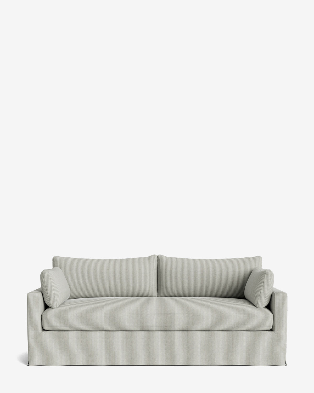 The Peterson Classic Slipcover Sofa (75-100) showcases light gray upholstery, feather blend seat and back cushions, two cylindrical arm pillows, all displayed on a plain white background by Vendixs