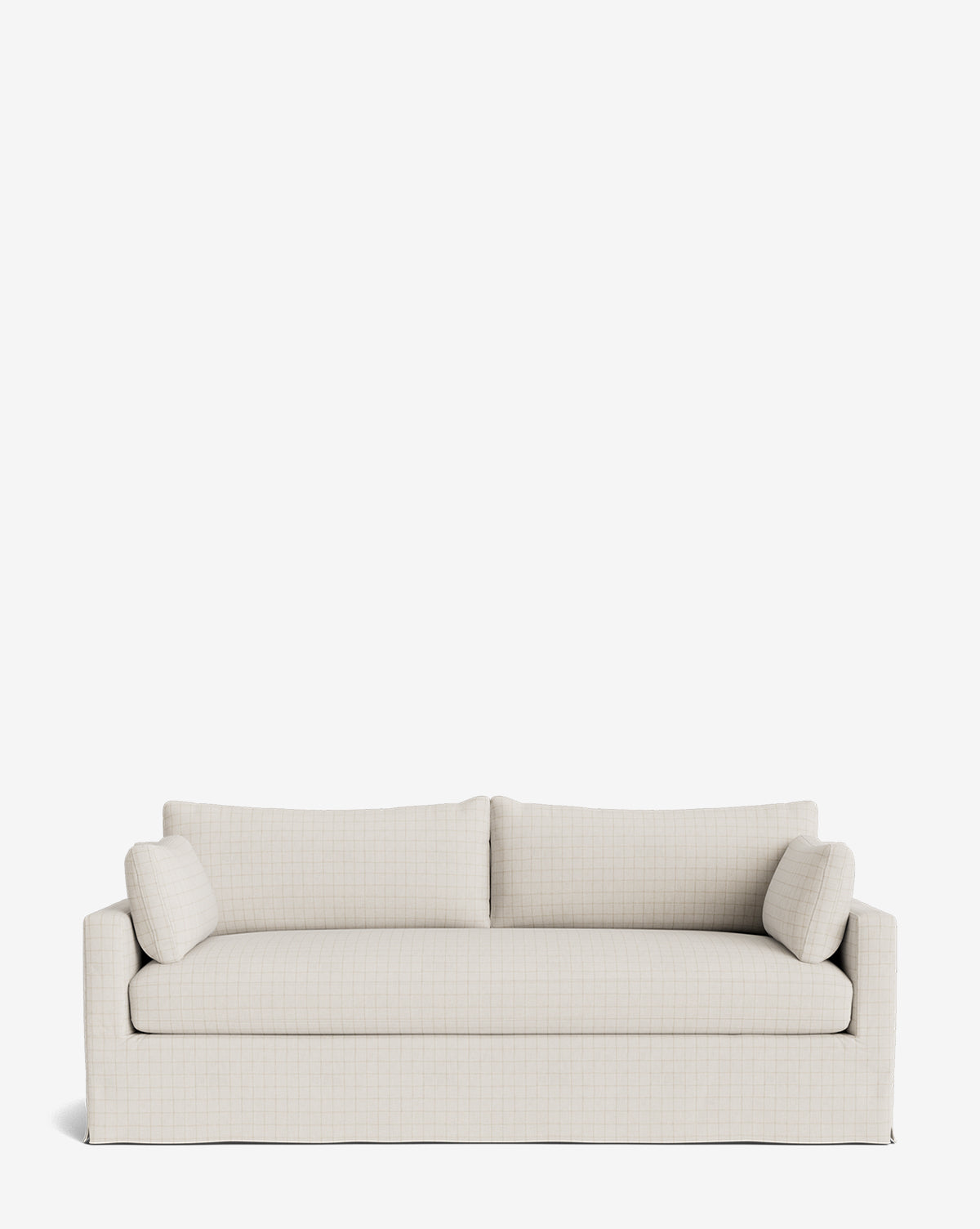 The Peterson Deep Slipcover Sofa (75-100) is a light beige, handcrafted sofa with a simple modern design, feather blend cushions, and two cylindrical side pillows, shown against a plain white background by Vendixs