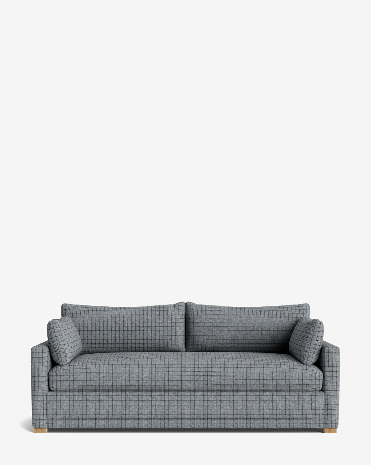 The Peterson Classic Upholstered Sofa (75 - 100) is a modern handcrafted gray piece with a subtle grid pattern, plush cushions (two seat, two back), and two matching side pillows, shown against a plain white background by McGee & Co.