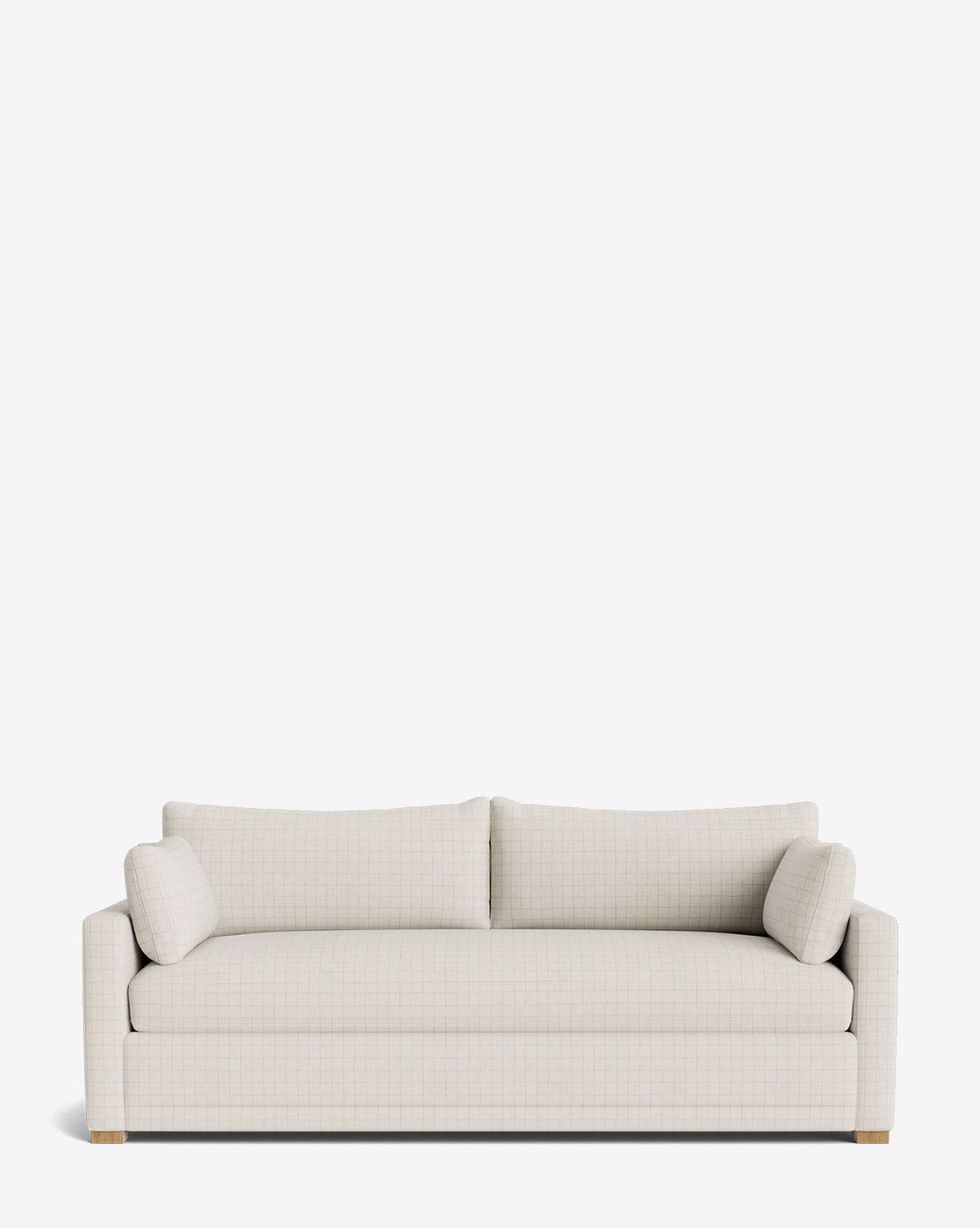 The Peterson Deep Upholstered Sofa (75-100) features a modern, light beige upholstery with straight arms, two square feather-blend cushions, small bolster pillows at each end, and short square wooden feet, by Vendixs Handcrafted and shown against a plain white background.