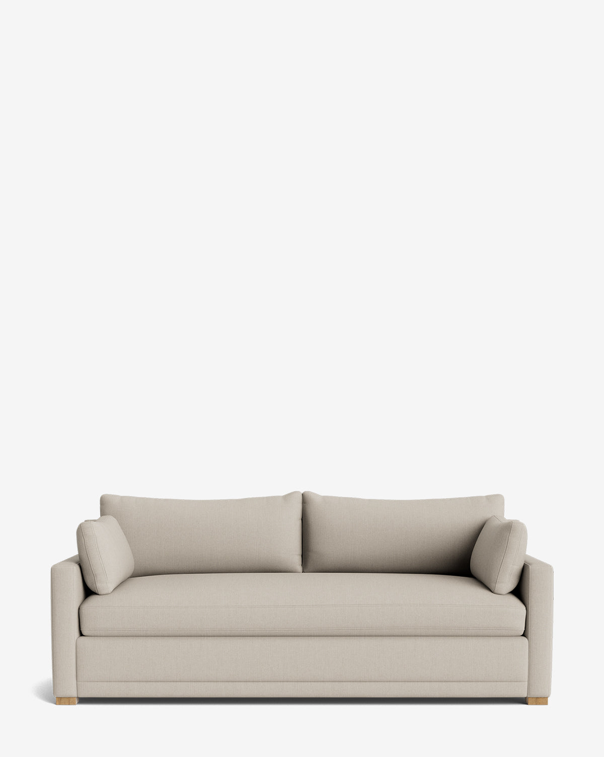 The Peterson Deep Upholstered Sofa (75-100) features a beige, modern design with straight arms, two seat and back cushions, and feather-blend bolster pillows, shown against a plain white background by Vendixs