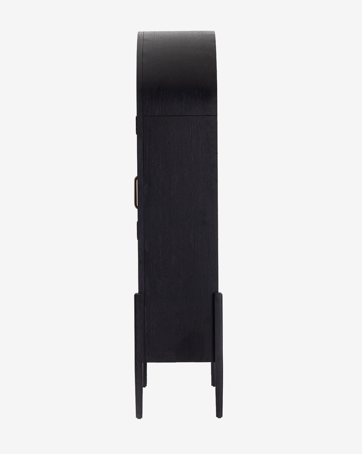 Side view of the Providence Cabinet, a tall, black solid oak piece with a curved top, four straight legs, and interior shelving, photographed against a plain white background by McGee & Co.