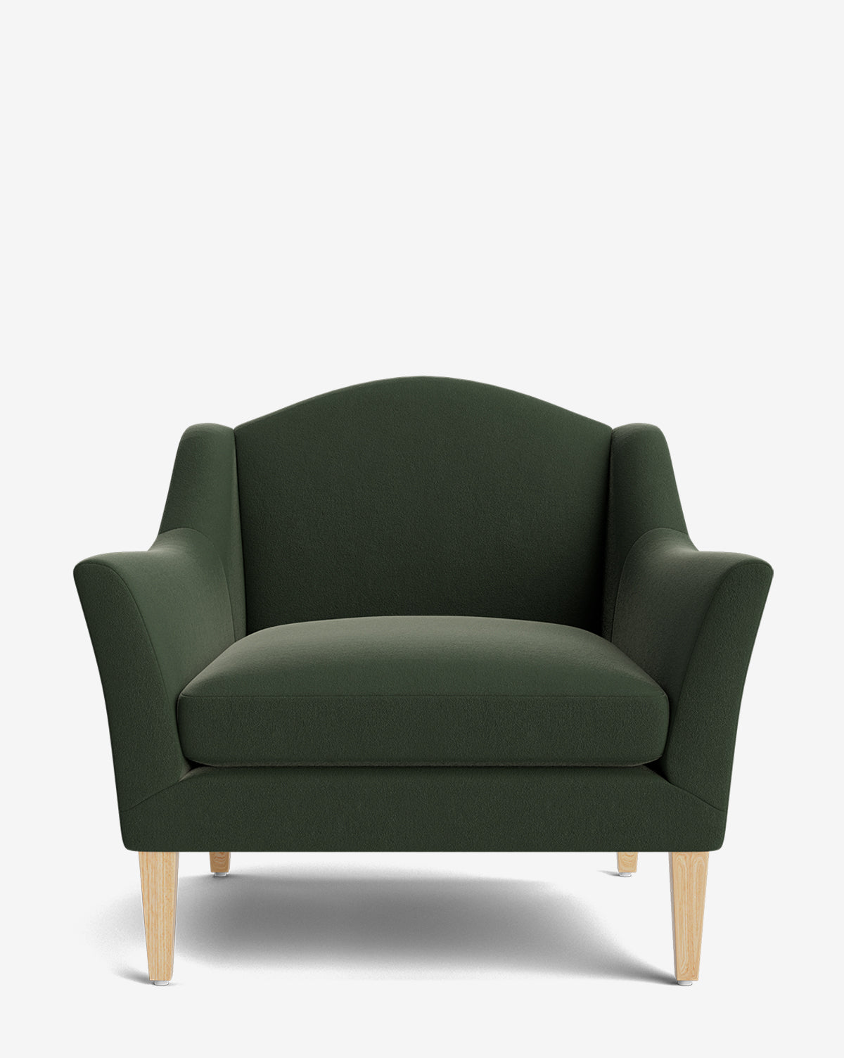 The Prudence Lounge Chair showcases premium dark green fabric, a classic silhouette with a wide seat, curved backrest, angled armrests, and four light wooden legs set against a plain white background by McGee & Co.