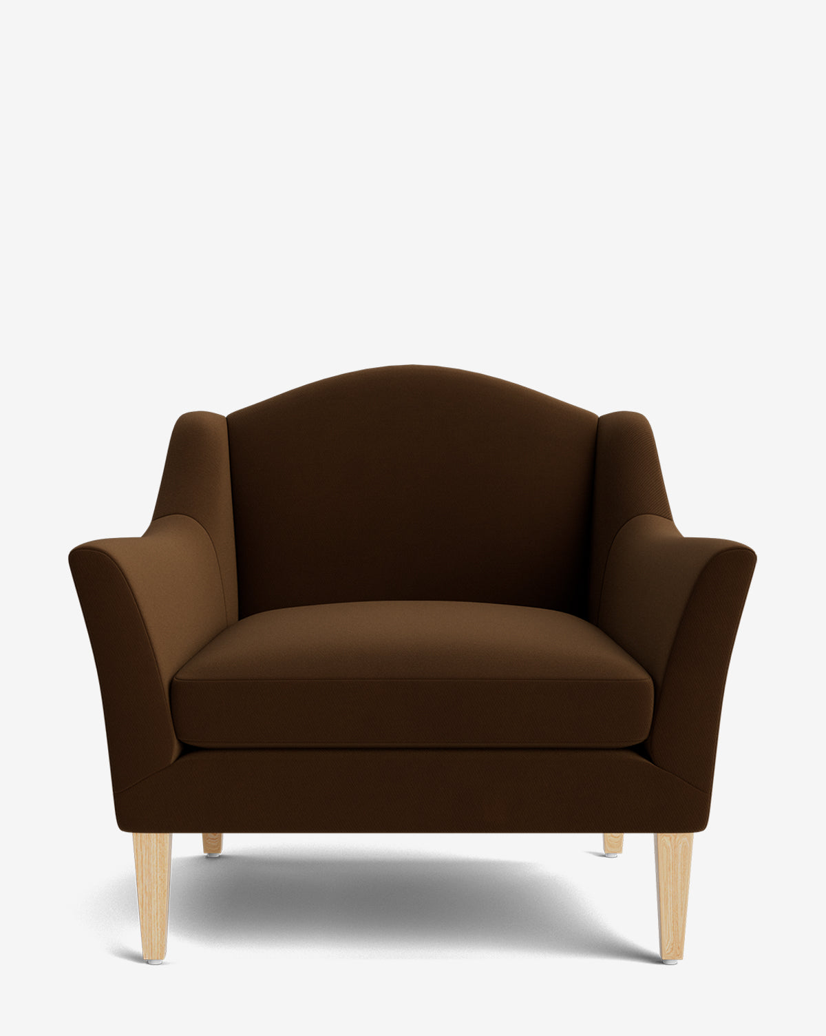 The Prudence Lounge Chair features a classic silhouette with wide, curved armrests and dark brown high-quality fabric upholstery, set on light wooden legs, all shown against a plain white background by McGee & Co.