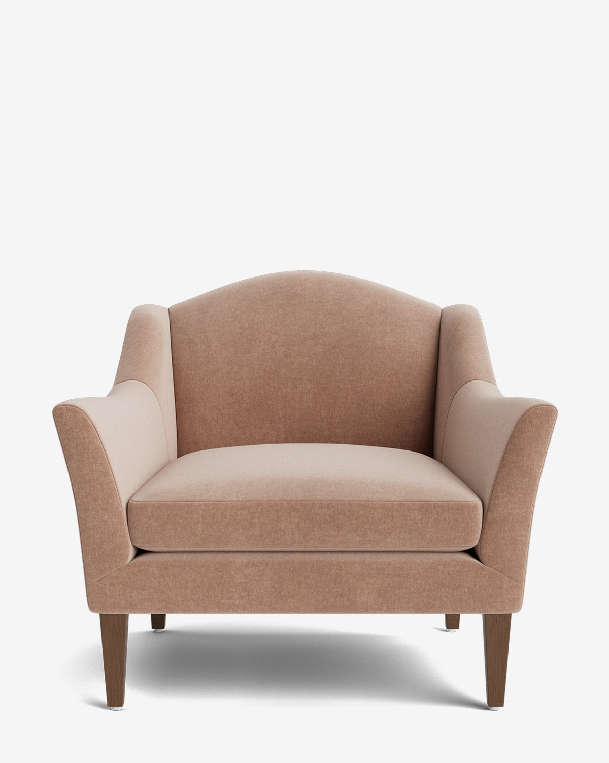 The Prudence Lounge Chair is a wide, light brown upholstered armchair featuring a classic silhouette, angled armrests, a curved backrest, and wooden legs, shown against a plain white background by McGee & Co.