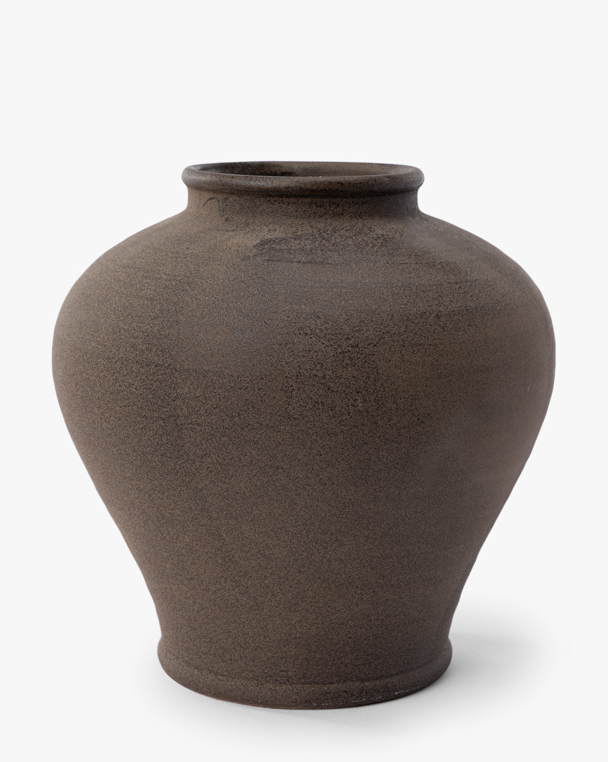 The Reading Vase is a large, round matte brown vase featuring a wide body, narrow base, and slightly flared opening, making it a striking piece of home decor against a plain white background, by Vendixs