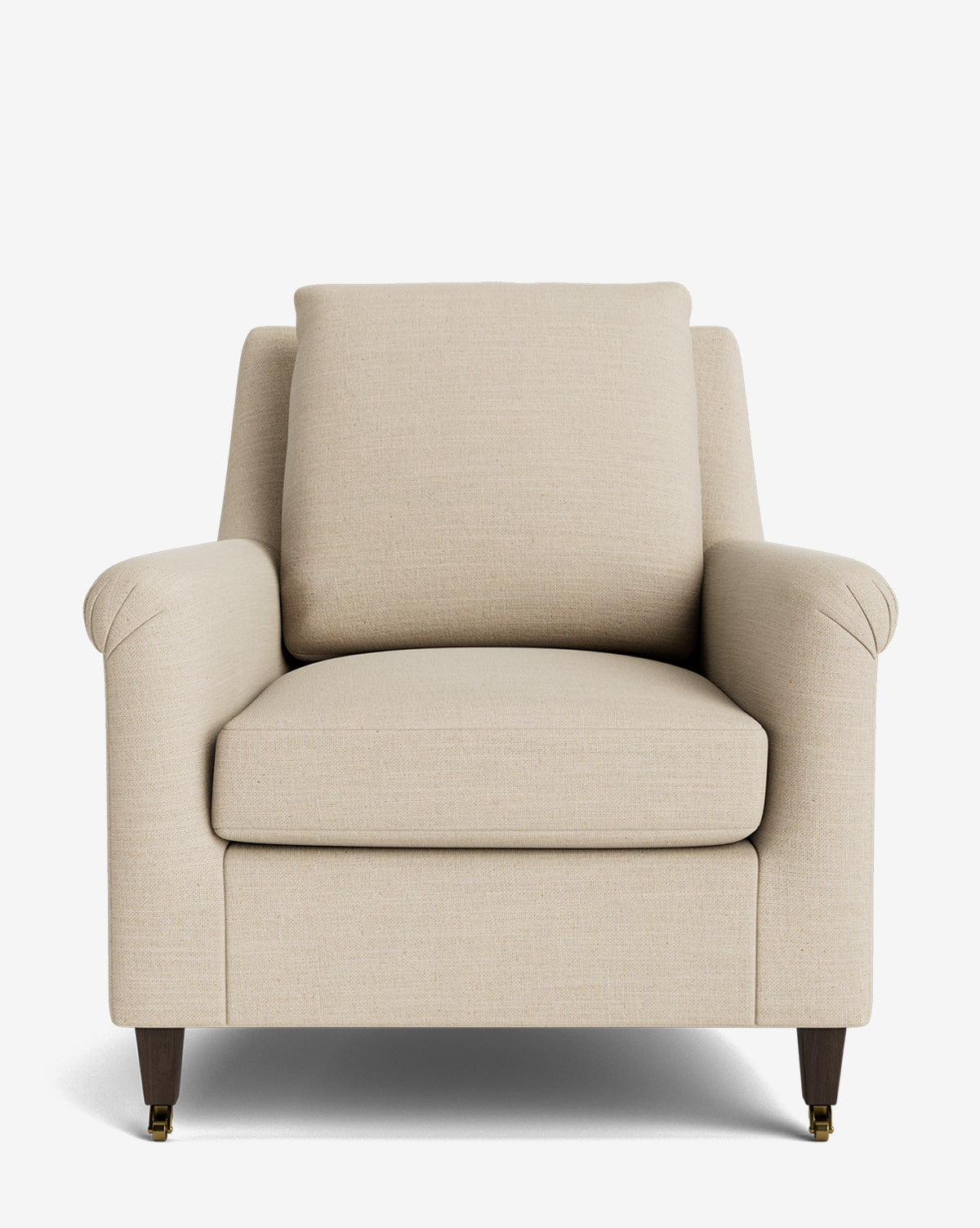 The Reedley Lounge Chair is a front-facing beige upholstered chair with cushioned back, seat, and armrests. It features deep seating, dark wooden legs, and front legs accented with small brass caster wheels, by Vendixs