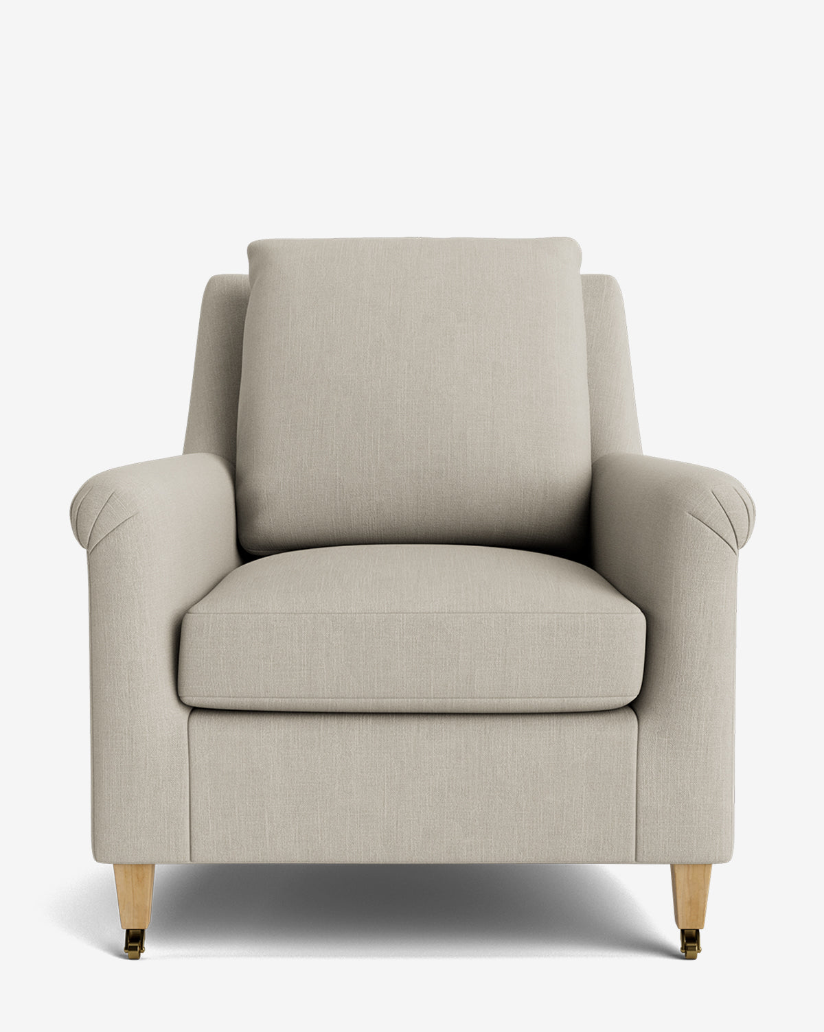 The Reedley Lounge Chair features beige upholstery, a cushioned seat and backrest, slightly angled armrests, and light wooden legs with front brass casters, all shown against a plain white background by McGee & Co.