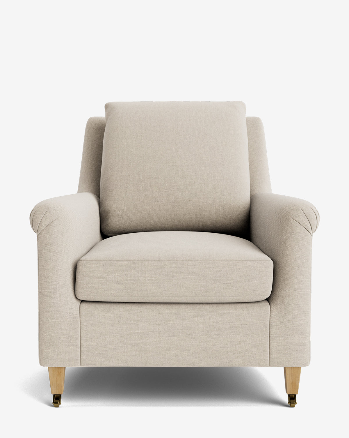 The Reedley Lounge Chair is a beige upholstered armchair with cushioned seat, back, and armrests. It stands on four wooden legs with brass-colored caps, shown from the front against a plain white background—a true luxury piece by McGee & Co.